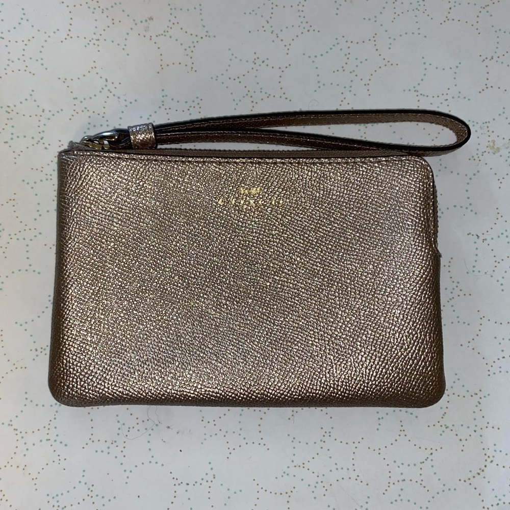 NWOT sparkling gold Coach corner zip wristlet